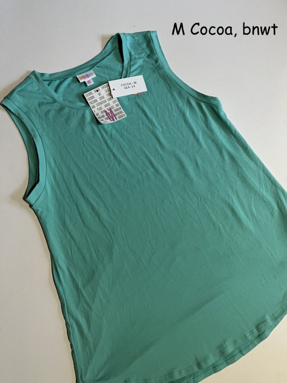 Medium Lularoe Cocoa tank top, mint green, leggings